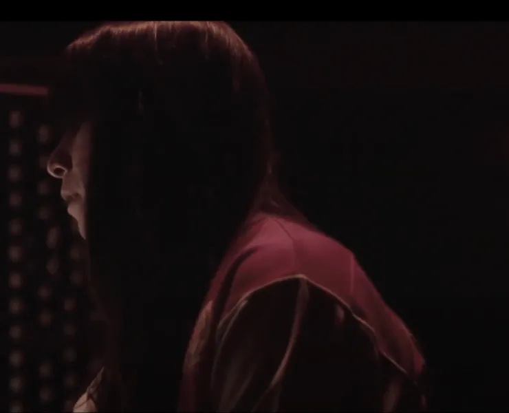 A woman sitting at a piano